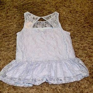 Pale blue “Altar’d state” tank. Never worn. Still has tag.